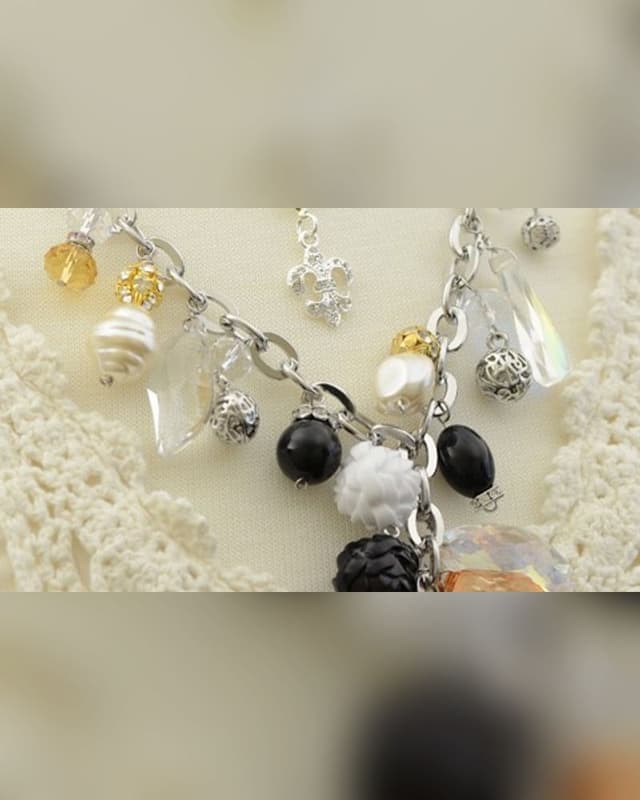 Charm necklace with pearls, crystals and black beads
