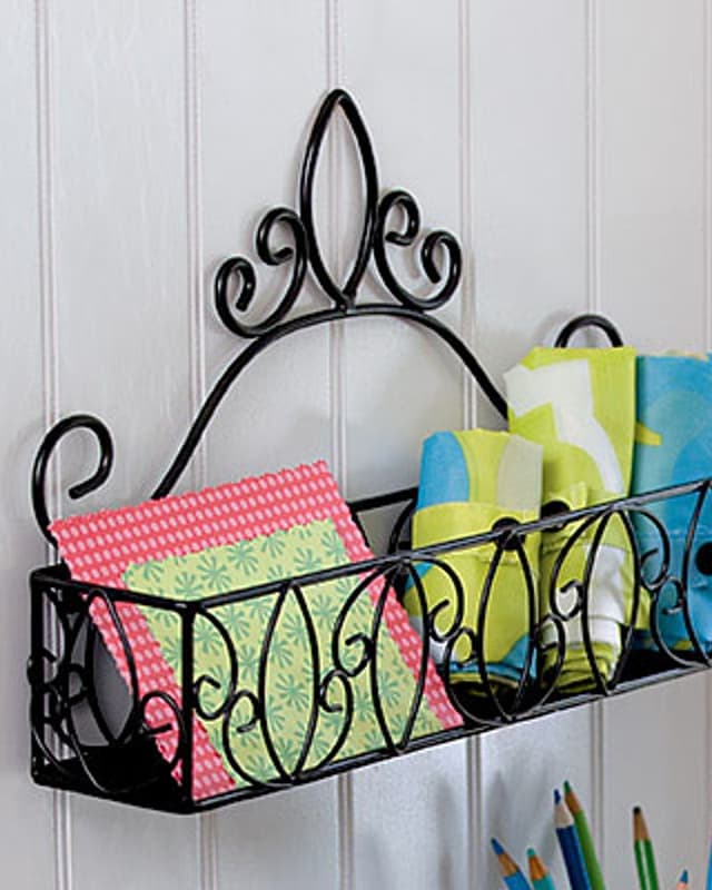 Scrolled iron wall basket