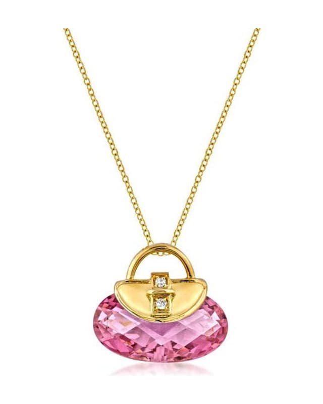 Gold-tone pendant necklace with a pink purse charm