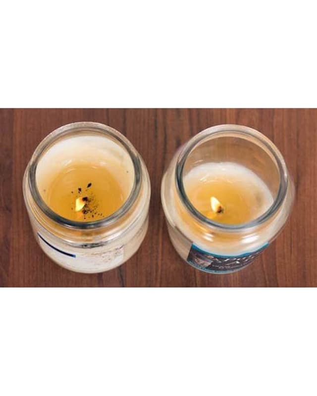 Burn test: a paraffin candle beside a David Oreck soy blend candle