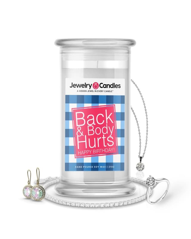 Jewelry candle in a glass jar with jewelry