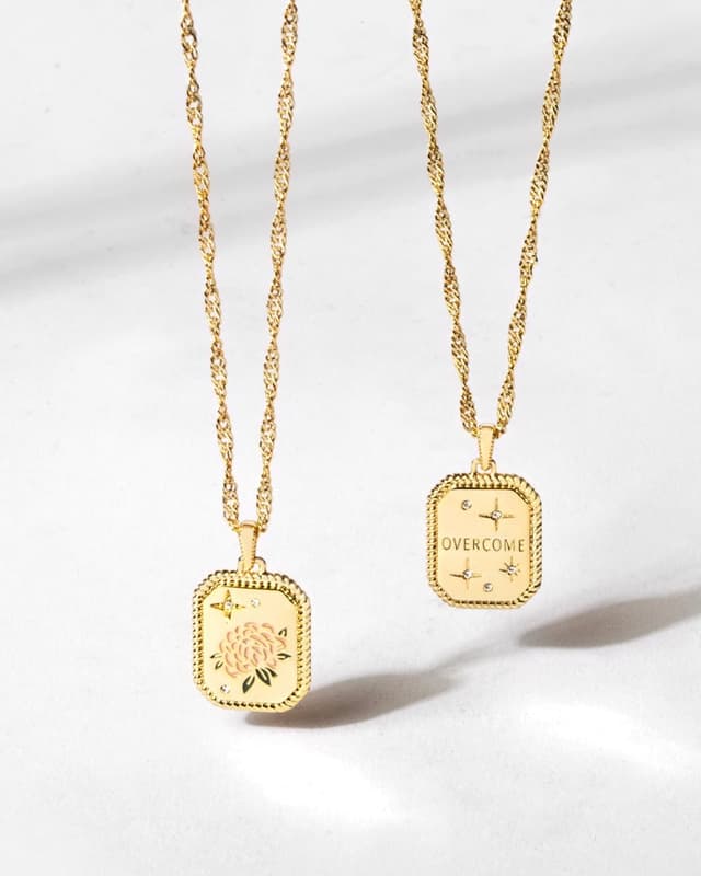 Overcome pendant necklaces in gold