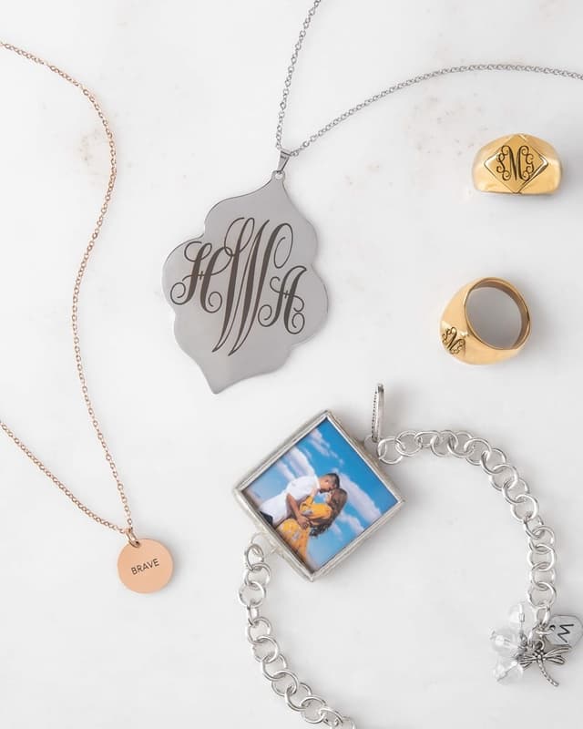 Engraved monogram pendant, signet rings and photo bracelet