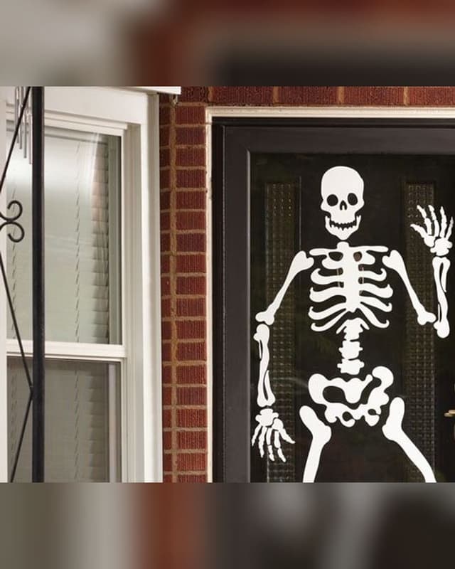 Halloween skeleton vinyl on a front door