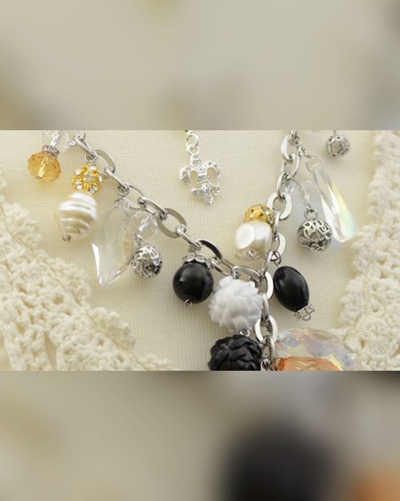 Charm necklace with pearls, crystals and black beads