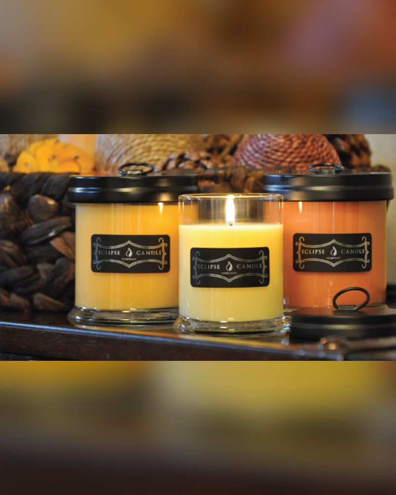 Jar candles with black lids and labels