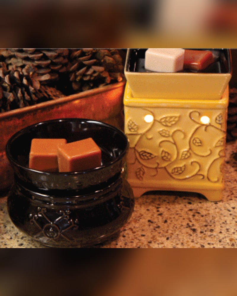 Black and yellow vine-pattern warmers