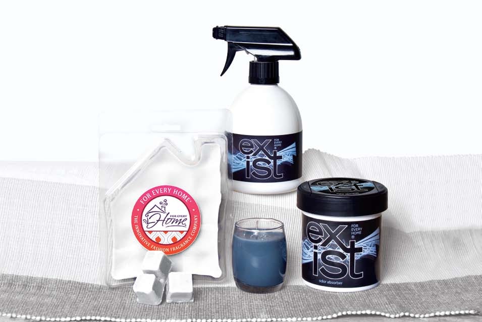 Six white For Every Home green cleaning spray bottles labelled for the baby room, kitchen, bathroom, office and bedroom on a polka-dot cloth