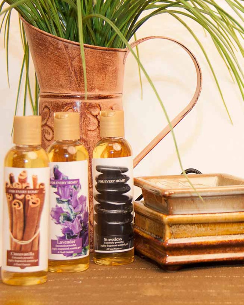 Nectar fragrance oils and a ceramic warmer
