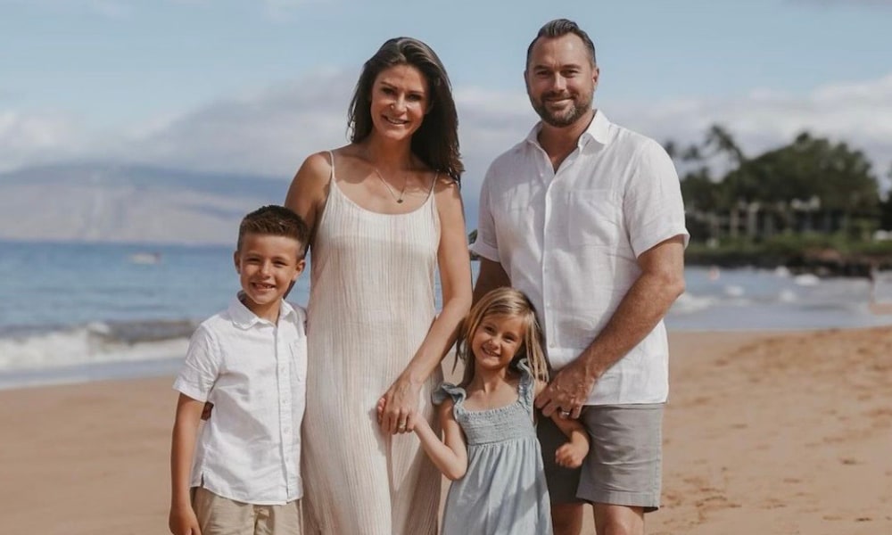 Hugh & Grace founders Sara and Ben Jensen on a beach with their children, Hugh and Grace