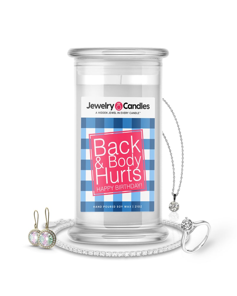 Jewelry candle in a glass jar with jewelry