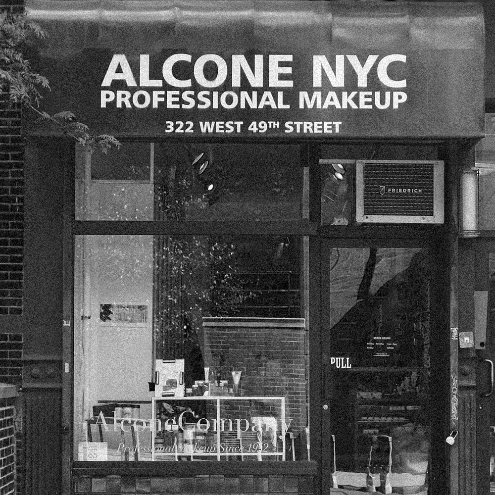 Black and white photo of the Alcone NYC Professional Makeup storefront at 322 West 49th Street