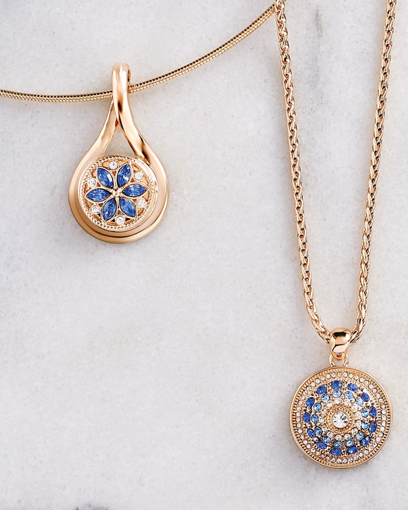 Gold-tone snap pendants with blue crystal Snaps
