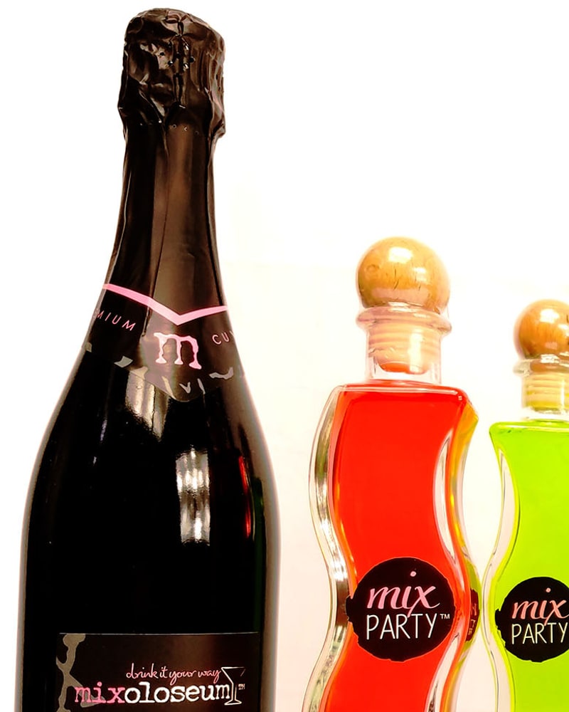 Bubbles red sparkling wine with wine cocktails in wavy bottles