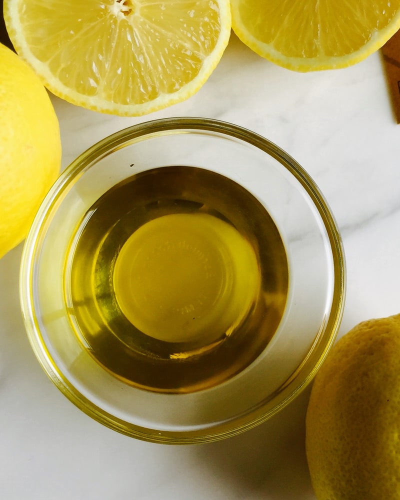 Lemon infused extra virgin olive oil with fresh lemons