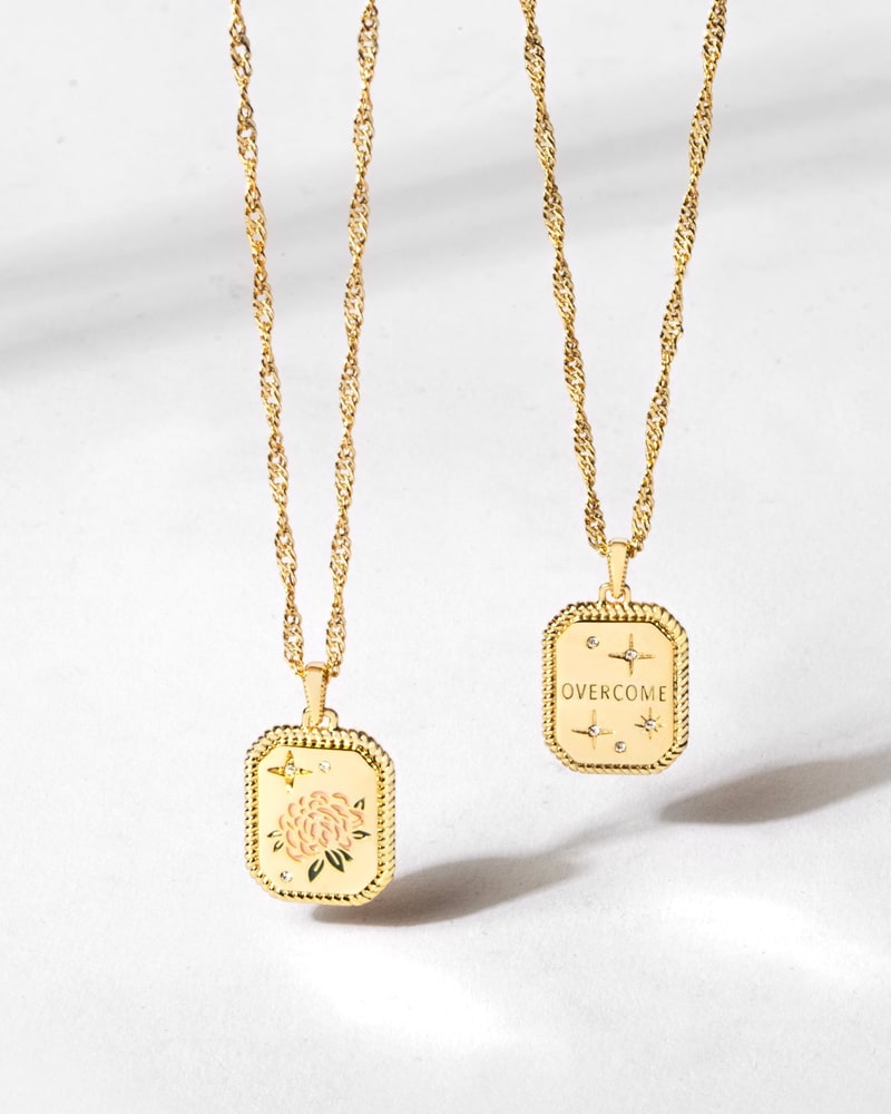 Overcome pendant necklaces in gold