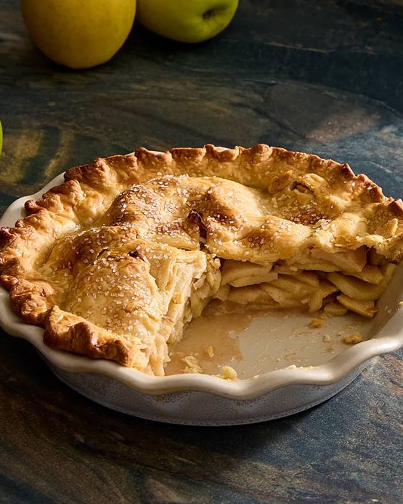 Apple pie in a stoneware pie plate
