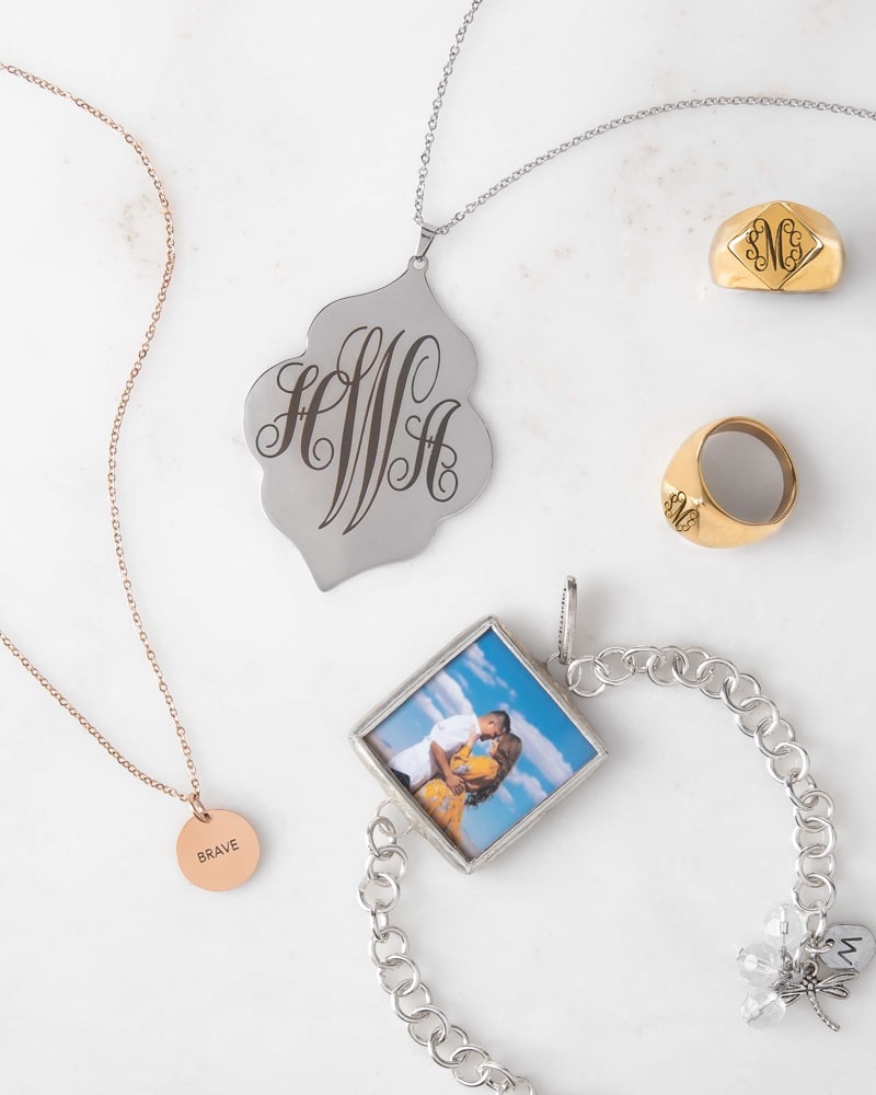 Engraved monogram pendant, signet rings and photo bracelet
