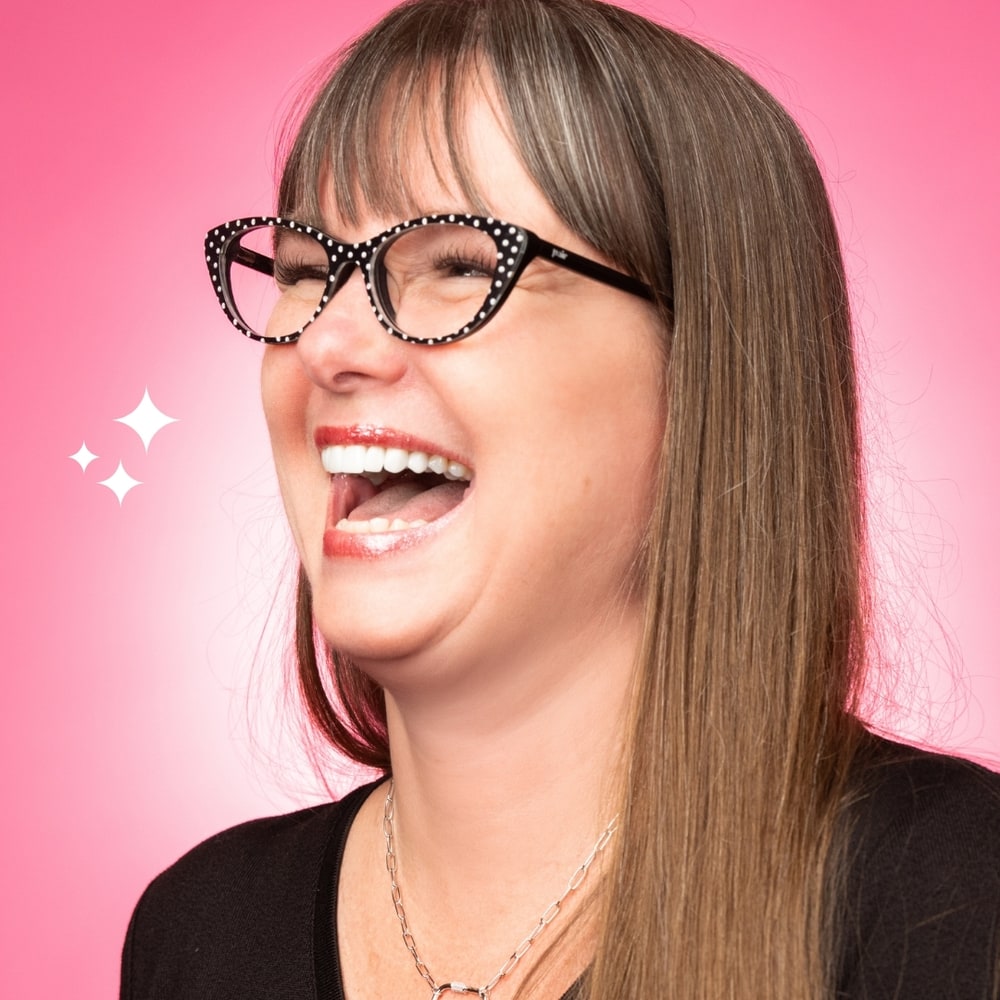 RYZE Party consultant laughing, wearing a sterling silver paperclip chain necklace