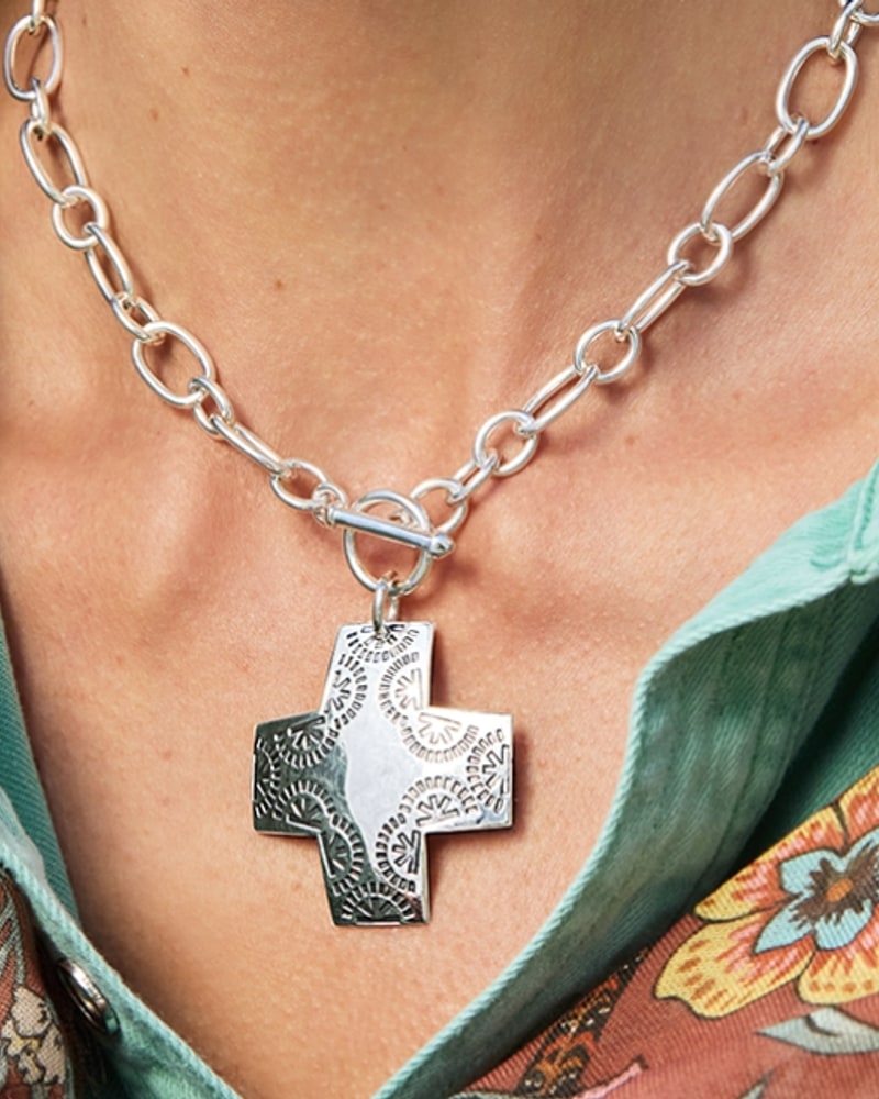 Sterling silver cross pendant on a link chain