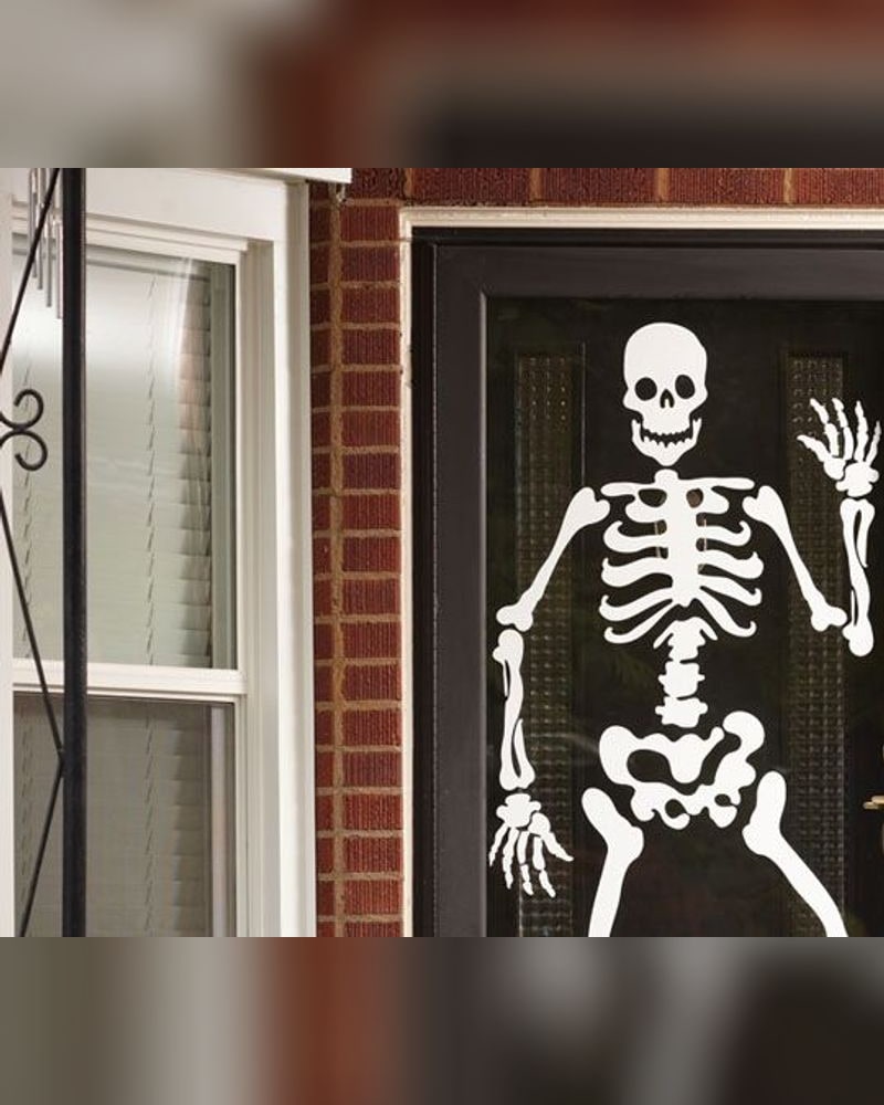 Halloween skeleton vinyl on a front door
