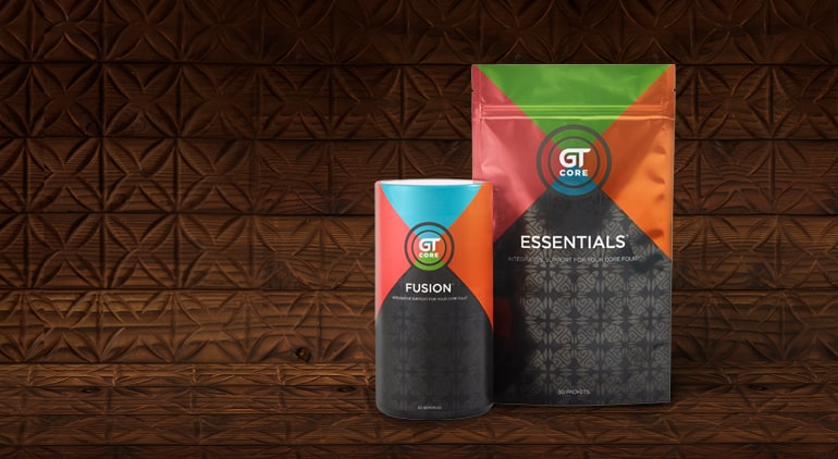 GT Core Fusion canister and Essentials pouch on a carved wooden background