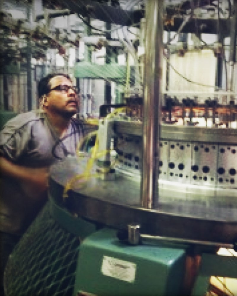 Knitting fabric at a Los Angeles mill for Winnie & Kat